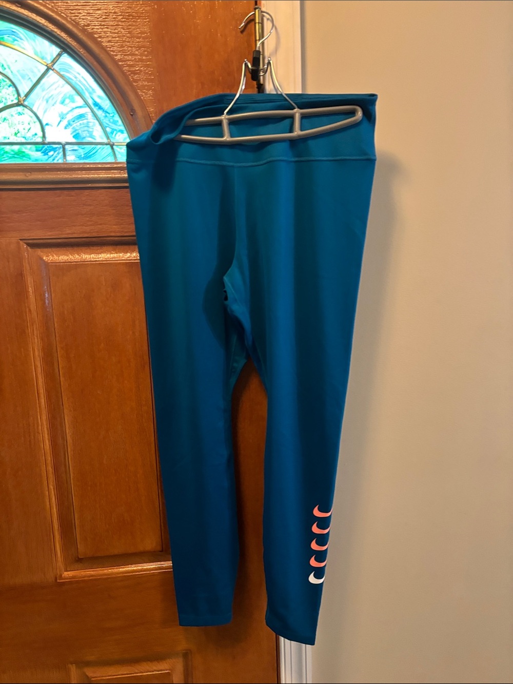 Nike Teal Leggings with Crescent Detail
